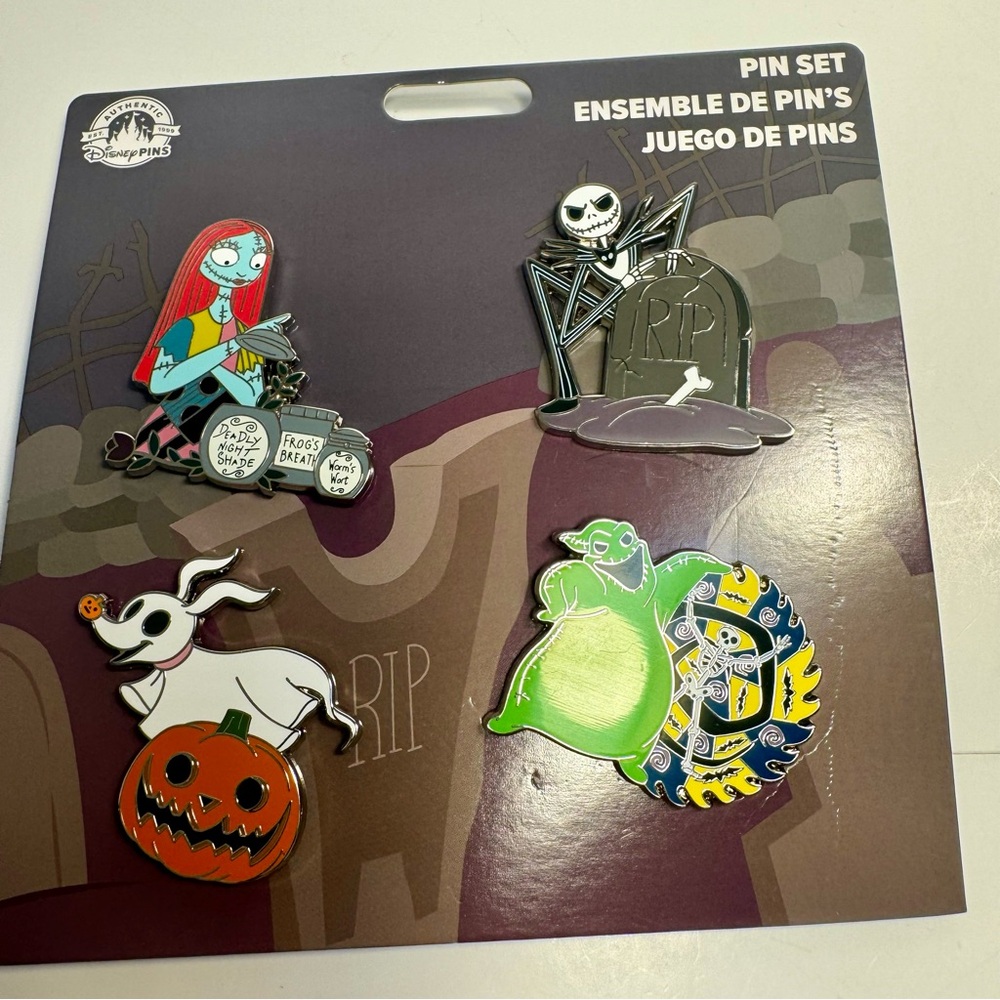 NWT. Disney Parks Nightmare Before Christmas 4 pin booster set of pins